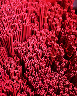 A stack of  red incense use by buddhist prayer at temple or home