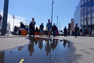 Reflection of people in water