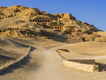 Aerial view of desert against clear sky