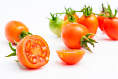 Close-up of fruits against white background