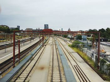 High angle view of train in city against sky