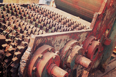 High angle view of rusty metallic machinery at factory