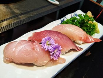 High angle view of fish in plate on table