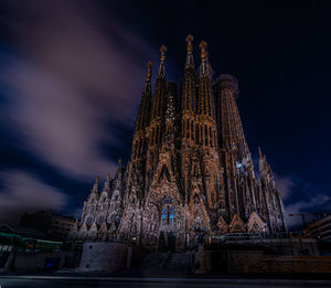 Low angle view of illuminated temple building against sky