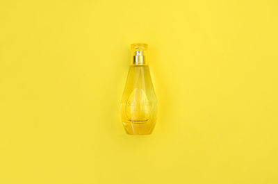 Close-up of yellow bottle