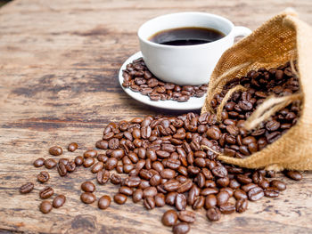Close-up of coffee beans on table