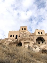 Low angle view of old building against sky