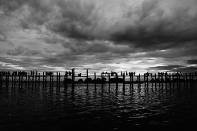 Pier on sea against sky