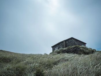 Low angle view of old ruin against sky