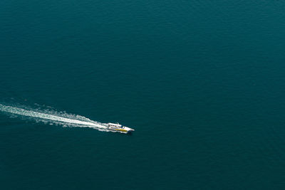 High angle view of ship sailing in sea
