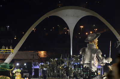 Illuminated fountain at night