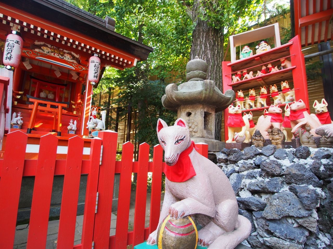 building exterior, built structure, architecture, statue, human representation, sculpture, art and craft, religion, art, red, spirituality, creativity, tree, low angle view, temple - building, place of worship, cultures