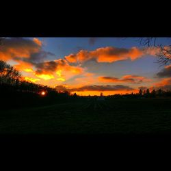 Scenic view of landscape at sunset