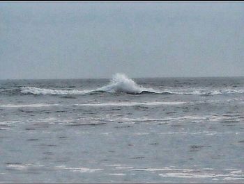 Waves splashing on rocks