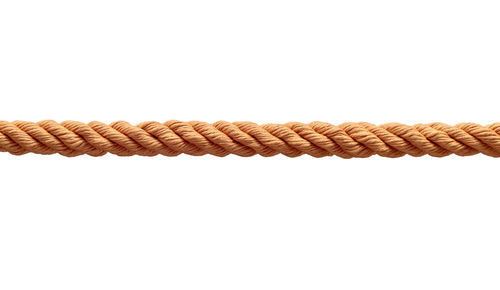 Close-up of rope against white background