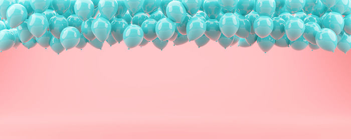 Multi colored candies against blue background