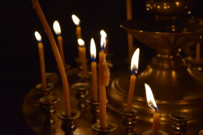 Close-up of burning candles