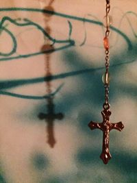 Close-up of chain on wall