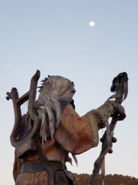 Low angle view of statue against clear sky