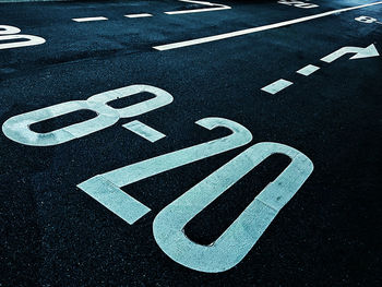 High angle view of numbers on road