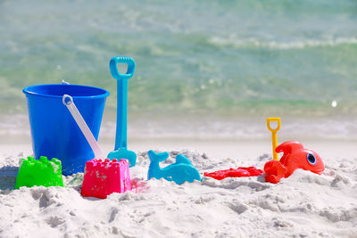 Multi colored toy on beach