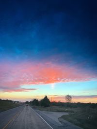 Road against sky during sunset