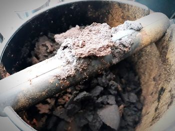 High angle view of cigarette in container