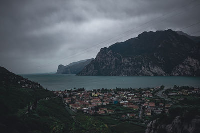 Panoramic view of sea and buildings against sky