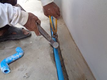 High angle view of man working on floor