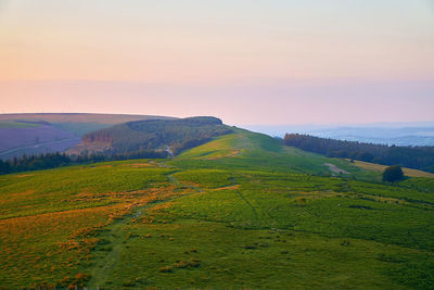 Scenic view of landscape against sky during sunset