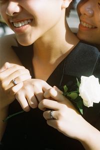 Close-up of woman holding hands