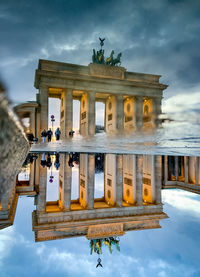 View of historical building against cloudy sky