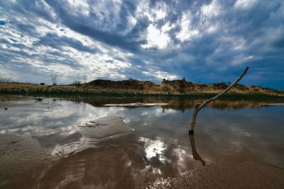 Scenic view of beach against sky