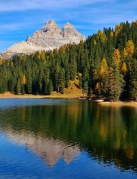 Scenic view of lake in dolomite against sky