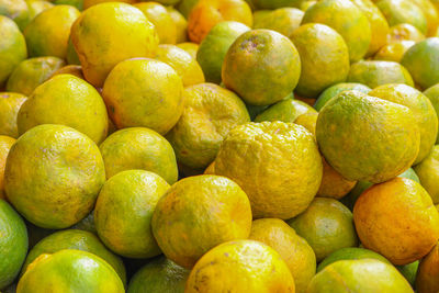 Full frame shot of lemons in market