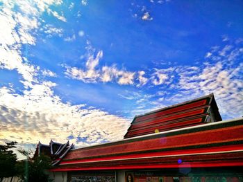 High section of building against blue sky