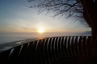 View of railing against sky during sunset