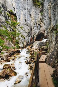 Scenic view of waterfall against sky