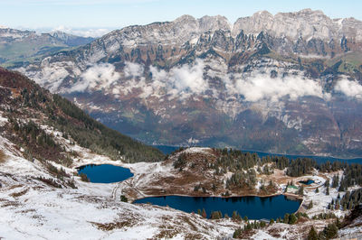 Scenic view of mountains against sky during winter