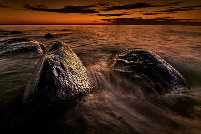 Scenic view of sea during sunset