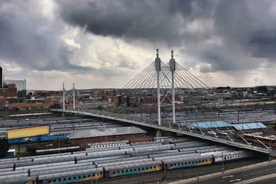 Nelson mandela bridge against cloudy sky