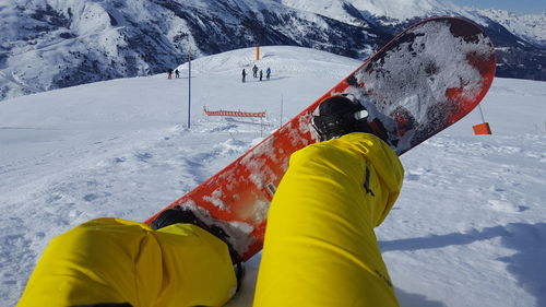 Person skiing on snowcapped mountain