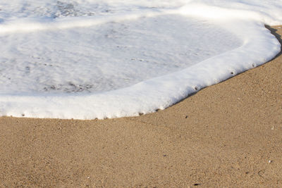 High angle view of snow on beach