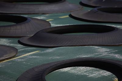 High angle view of tires on tarpaulin