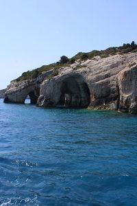 Scenic view of sea against clear blue sky