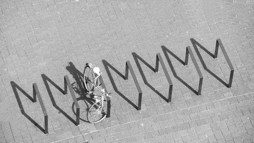 High angle view to shadows of parking area of bicycles stand