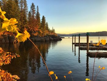 Scenic view of lake against sky during autumn