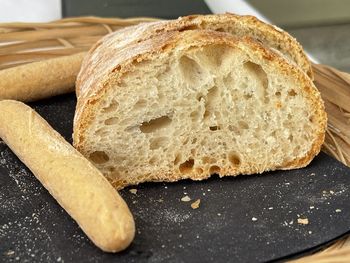 High angle view of bread on cutting board