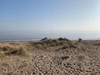 Scenic view of sea against clear sky