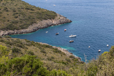 High angle view of sailboat on bay